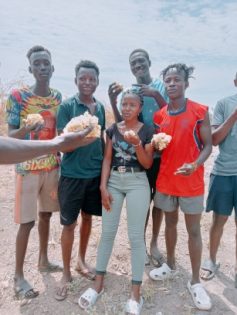 Lobur missionaries enjoying a taste of traditional food